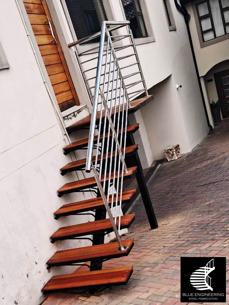 Steel mono stringer staircase with balau clad treads and stainless steel balustrades. Johannesburg, Pretoria, Durban, Gauteng, KwaZulu Natal