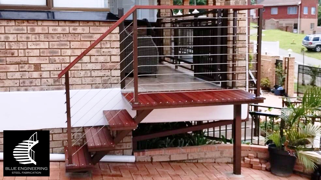Steel mono stringer staircase with balau clad treads and cable balustrades. Johannesburg, Pretoria, Durban, Gauteng, KwaZulu Natal
