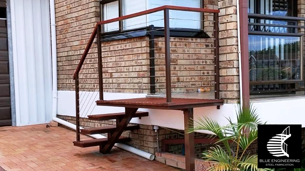 Steel mono stringer staircase with balau clad treads and cable balustrades. Johannesburg, Pretoria, Durban, Gauteng, KwaZulu Natal