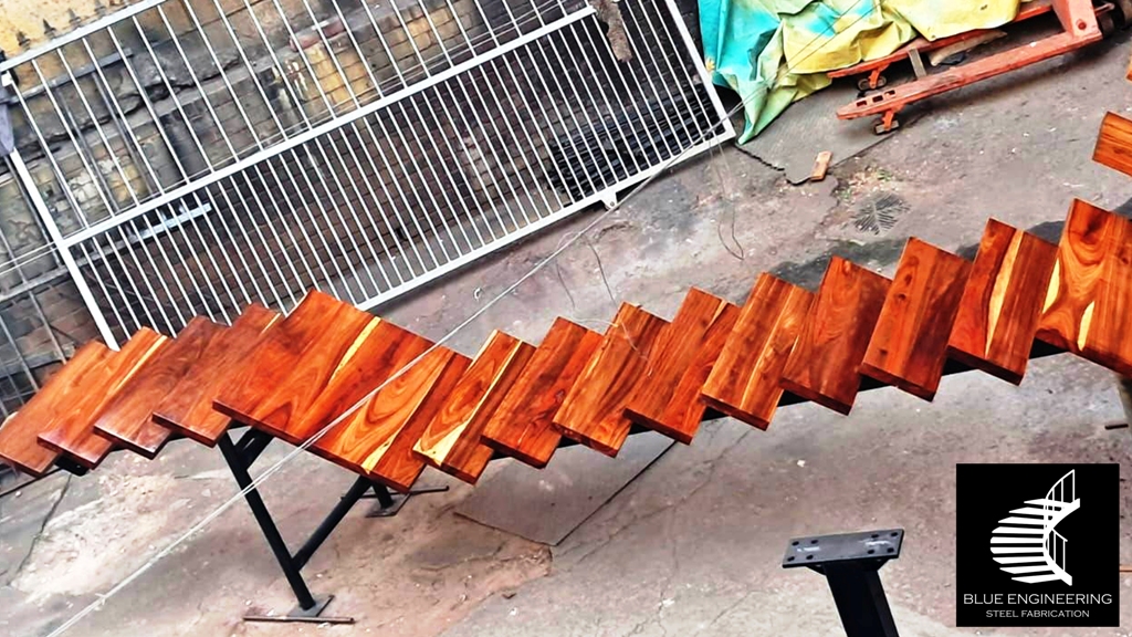 Steel mono stringer staircase with Kiaat treads. Johannesburg, Pretoria, Durban, Gauteng, KwaZulu Natal