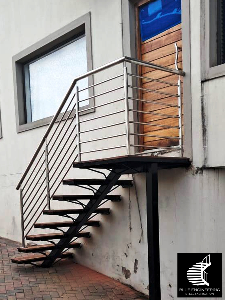 Steel mono stringer staircase with balau clad treads and stainless steel balustrades. Johannesburg, Pretoria, Durban, Gauteng, KwaZulu Natal